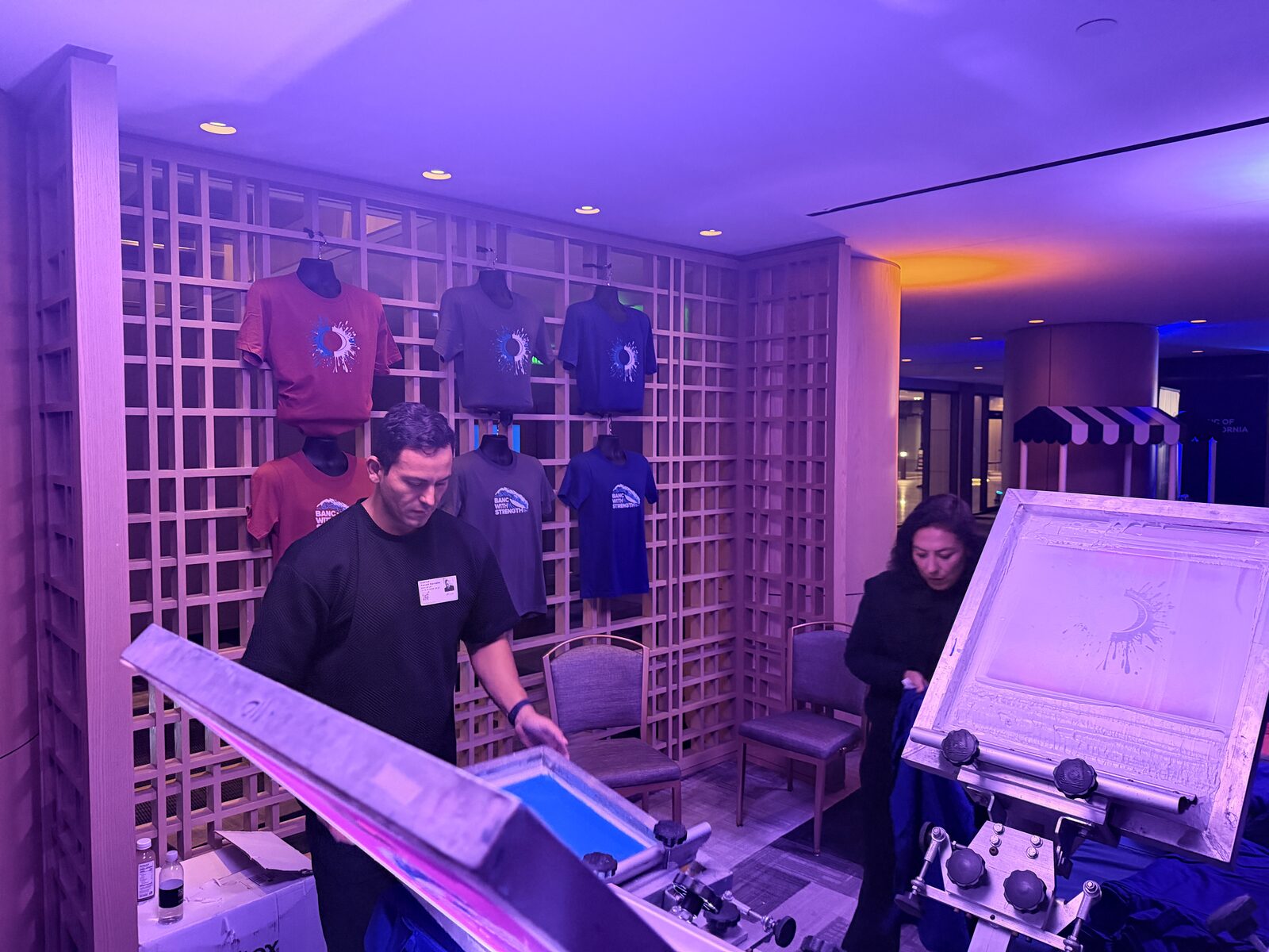 Merch Troop live screen-printing station running at a San Francisco event